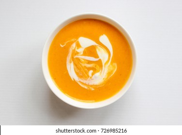 Bowl Of Butternut Squash Soup On A White Background,isolated,squash Soup,top View