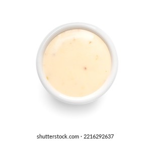 Bowl With Caesar Salad Dressing On White Background