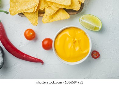 Bowl With Cheese Dip With Nacho, On White Background, Top View Or Flat Lay