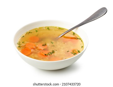 Bowl Of Chicken Broth Soup With Vegetables And Rice Isolated On White Background