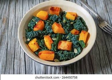 Bowl Of Chopped Kale With Butternut Squash Salad