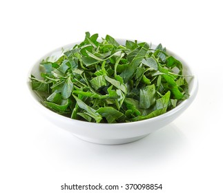 Bowl Of Chopped Parsley Leaves Isolated On White Background