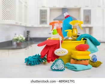 Bowl With Cleaning Products On Table Over Blurred Kitchen Background