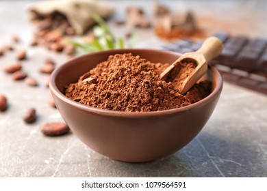 Bowl With Cocoa Powder On Table