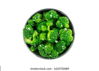 A Bowl Of Cooked Broccoli, Isolated On A White Background With A Clipping Path, Shot From Above With Salt