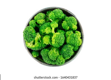 A Bowl Of Cooked Broccoli, Isolated On A White Background With A Clipping Path, Shot From The Top