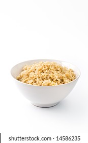 Bowl Of Cooked Quinoa With Onion Isolated On White