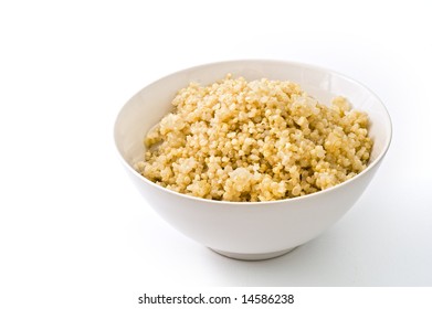 Bowl Of Cooked Quinoa With Onion Isolated On White