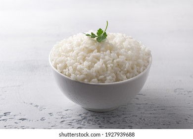 Bowl Of Cooked White Rice On Light Gray Textured Background, Selective Focus, Horizontal