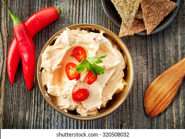 Bowl Of Cream Cheese With Chili And Tomato, Dip Sauce On Wooden Table, Top View