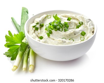 bowl of cream cheese with green onions and herbs, dip sauce isolated on white background - Powered by Shutterstock