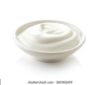 Bowl Of Cream On White Background