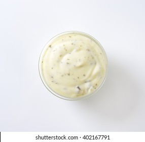 Bowl Of Creamy Salad Dressing On White Background