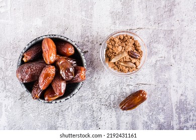 Bowl With Date Pit Powder For Making Coffee On The Table. Caffeine Free Alternative To Coffee. Top View