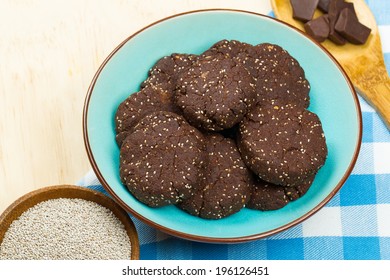 Bowl Of Delicious Healthy Dark Chocolate And Chia Seed Cookies With Ingredients