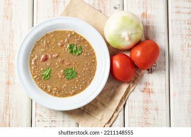 A Bowl Of Delicious Hearty Homemade Curried Lentil Soup.