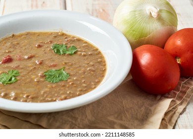 A Bowl Of Delicious Hearty Homemade Curried Lentil Soup.