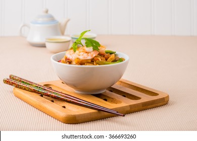 Bowl Of Delicious Pad Thai Served With Green Tea.