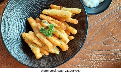 A Bowl Of Delicious Potato Cheese Stick 