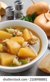 Bowl Of Delicious Turnip Soup On Table