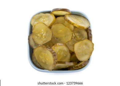 A Bowl Of Dill Pickle Slices In A Top View Image