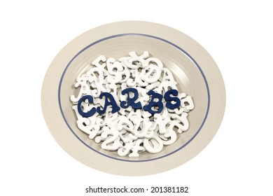 Bowl filled with white letters with blue letters spelling CARBS