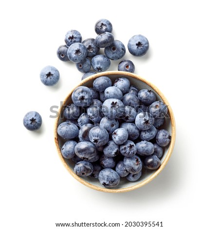 bowl of fresh blueberries isolated on white background, top view