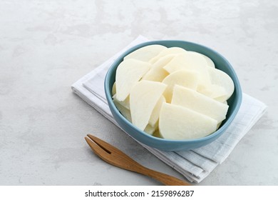 A bowl of fresh jicama or bengkoang (Jicama slices), gut health.
