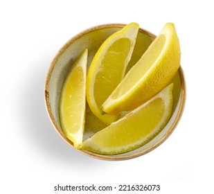 Bowl Of Fresh Lemon Slices Isolated On White Background, Top View