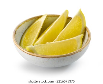 Bowl Of Fresh Lemon Slices Isolated On White Background