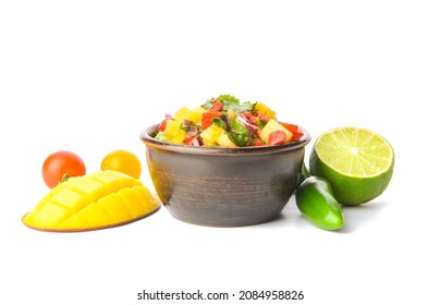 Bowl With Fresh Mango Salsa On White Background