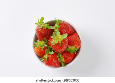 Bowl Of Fresh Strawberries On White Background