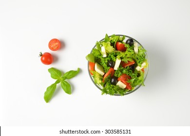 Bowl Of Fresh Vegetable Salad On White Background