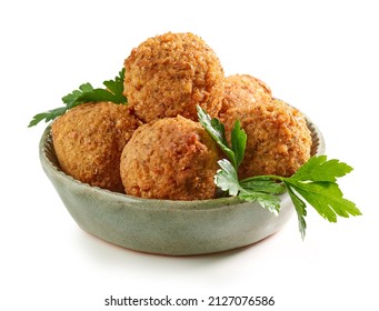 bowl of fried falafel balls isolated on white background - Shutterstock ID 2127076586
