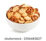 Bowl full of delicious salty crackers and pretzels isolated on white background. Party food. 