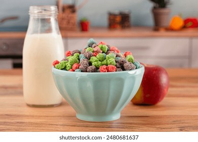 Bowl Full of Red Purple Green and Blue Berry Flavored Kids Cereal on a Wooden Kitchen Table - Powered by Shutterstock