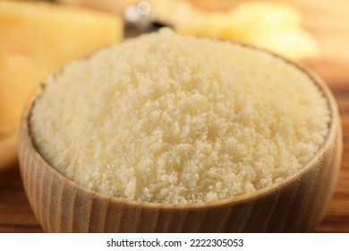 Bowl With Grated Parmesan Cheese On Table, Closeup