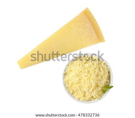 bowl of grated parmesan and whole cheese wedge