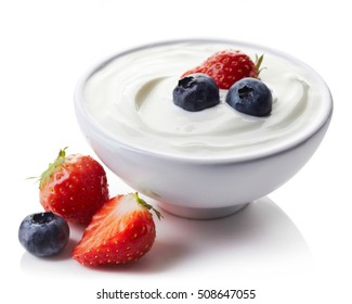 Bowl of greek yogurt and fresh berries isolated on white background