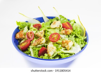 A Bowl Of Healthy Salad With Chicken, Lettuce, And Organic Vegetables