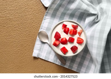 Bowl Of Healthy Strawberry Yogurt On Color Background