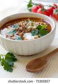 A Bowl Of Homemade Chili Lentil Soup With Meat