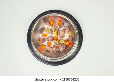 Bowl Of Homemade Dog Food, Rice, Vegetables And Meat