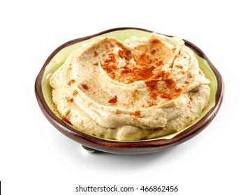 Bowl Of Hummus Isolated On White Background