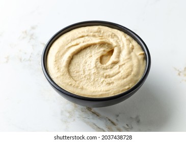 Bowl Of Hummus On Kitchen Table