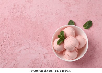 Bowl With Ice Cream And Mint On Pink Background, Top View