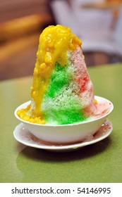 Bowl Of Ice Kacang (red Bean) Dessert With Mango And Corn Topping