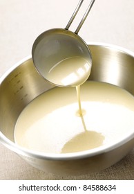 Bowl And Ladle Of Pancake Batter