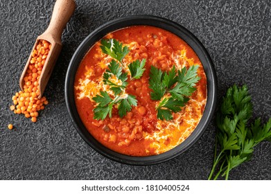 Bowl Of Lentil Tomato And Coconut Soup Flat Lay