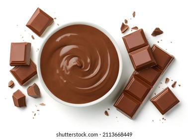 Bowl of melted milk chocolate and broken pieces of chocolate bar isolated on white background, top view